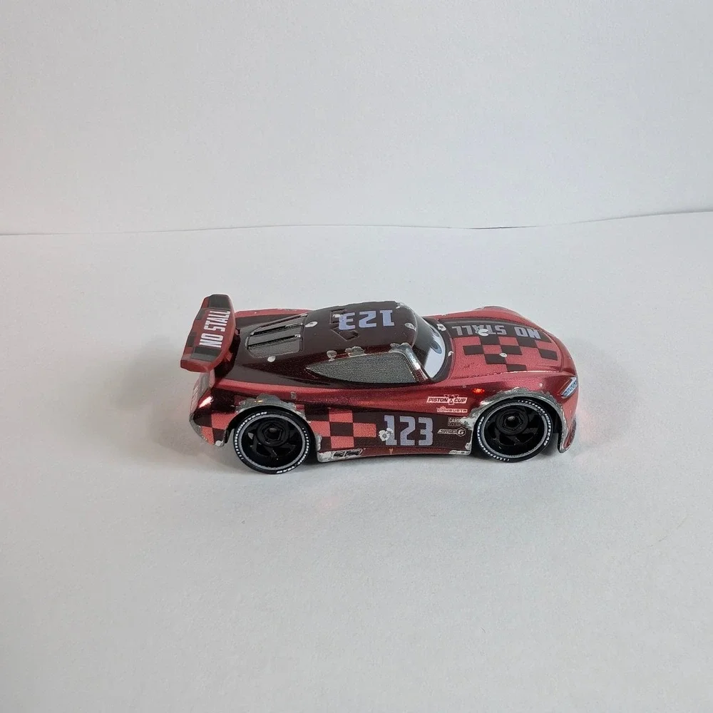 Disney Pixar Cars No Stall Jonas Revera Next Gen Diecast Red Metallic 123